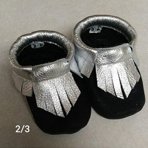 Black and silver baby moccasins